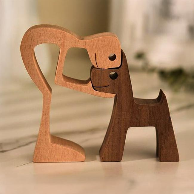 Custom wooden puzzle crafts dog and pet owner carving by Lutefisk Woodworking in Port Edwards, WI